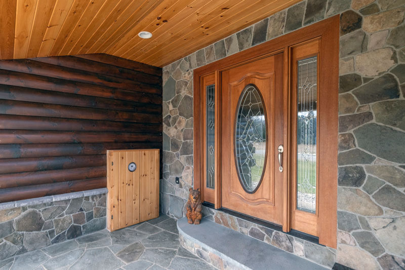 An elegant and cozy front door built with top-tier construction materials and building supplies.